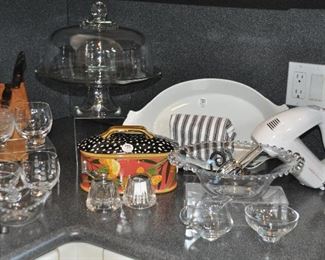 More Great Serving Pieces includes a Heavy Glass Domed Cake Plate, Apilco White Bakeware (SOLD), Sunbeam Hand Mixer (SOLD), Cutco Knives(SOLD) and a Droll Designs Covered Serving Piece