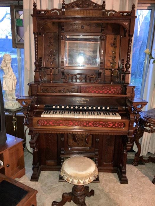 . . . this piece is stunning -- a Victorian-style organ with stool