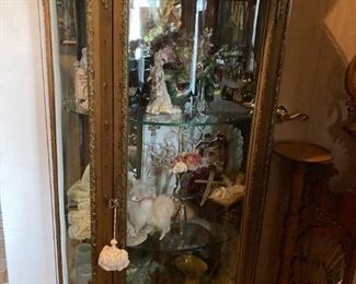 . . . love this petite curio cabinet filled with treasures