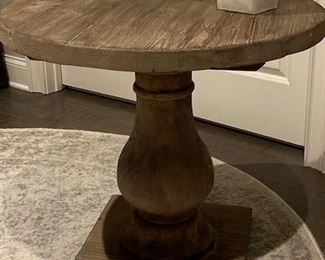 PRICE - $350; Distressed wood round side table with pedestal base; 28" wide x 25" high.