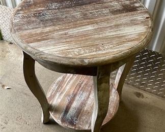 PRICE - $185/each; Pair of distressed wood round side table with four legs; 20" wide x 24" high.