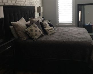  PRICE - $1,850; Arhaus "The Felix" king bed with blackish gray upholstered headboard; includes mattress set. (Bed linens not included.)