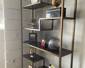 PRICE - $1,250/each; Pair Mitchell Gold shelf units with geometric designs; bronze/metal structures; 49" wide x 14" deep x 87" wide. 