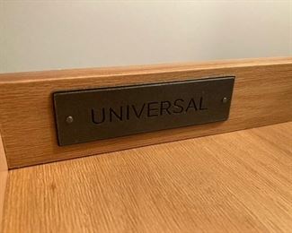 Universal logo inside night stands.