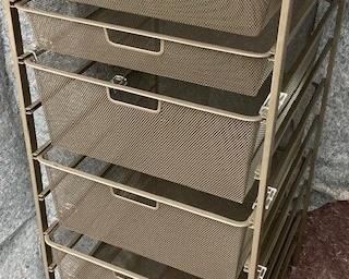 PRICE - $75; metal filing cabinet on rollers.