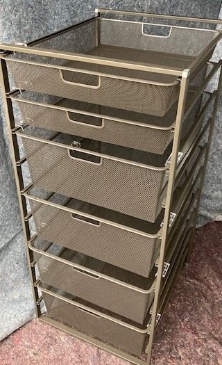 PRICE - $75; metal filing cabinet on rollers.