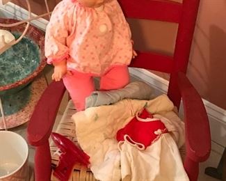 Vintage doll and child’s rocker