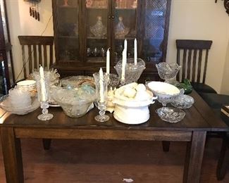 Vintage Wooden Table and 6 padded Chairs and matching China Hutch. Crystal Candle Holders, Punch Bowls, Candy Dishes and more