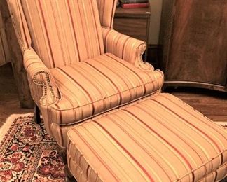 One of two wingback chairs; one ottoman