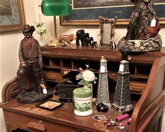Roll top desk; leather cowboy statue; other décor 