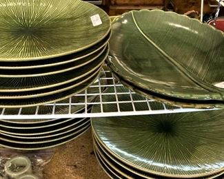 More green plates and serving pieces