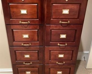 One wooden file cabinet available.