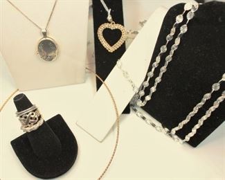 Silver and Gold - Four Sterling Rings, 1 heart Pendant and three sterling necklaces, one with locket
