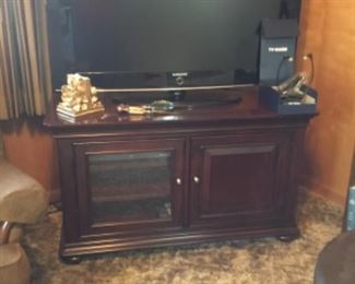 Samsung TV and TV cabinet