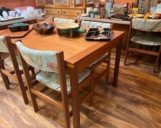 Teak table and chairs, hidden leaves