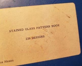 Stained Glass book and a box of stained glass pieces