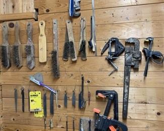 Wall of Clamps, Saw Blades, Wire Brushes and Crescent Wrenches