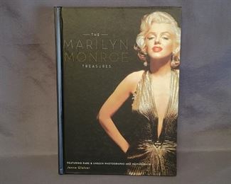 Marilyn Monroe Treasures Book by Jenna Glatzer
Very unique book with pull-out reproduction memorabilia including Birth Certificate, Marriage License, honeymoon airine tickets, personal letters, etc.