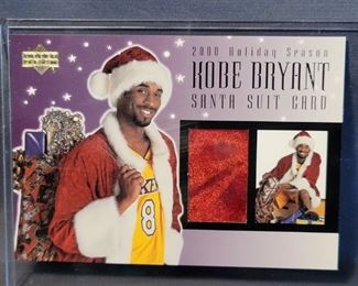 Kobe Bryant, 2000 Holiday Santa Suit Card
Piece of Santa Suit that was worn by Kobe Bryant