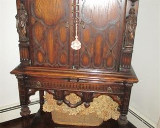 Vintage Cupboard With Ornate Renaissance Knight Carved Detailing 