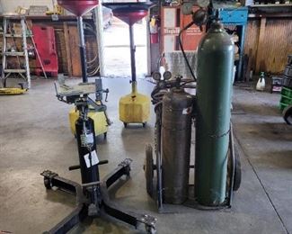 Transmission stand, Oil pan drains,  Acetylene torch