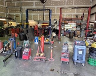 Drain buckets, Robinair AC Machine, Battery Chargers, Coil Spring Compression Stand, Air jack, engine stand, air tank