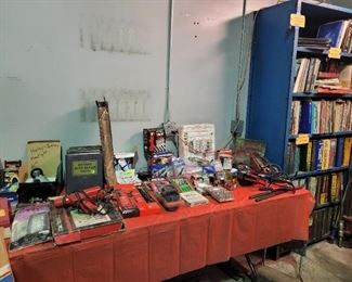 Timing lights, handheld battery testers,  Chilton manuals-  some for the classic car enthusiasts. Heavy duty steel book shelf. They don't make them like this anymore!