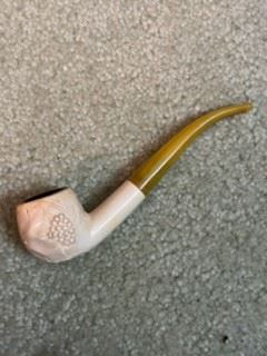 I can't find a name, however, it might be Ivory with a celluloid mouthpiece?