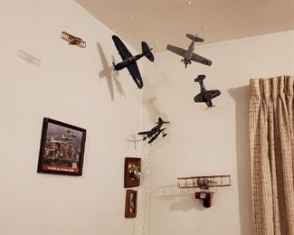 Various small model planes throughout the home