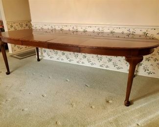 Queen Anne dining table (shown with 2-leaves) approx 10"