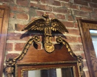CLOSE UP VIEW OF CHIPPENDALE 18TH CENTURY MIRROR, AMERICAN CARVED GILDED GOLD AMERICAN STANDING EAGLE STANDING ON SCALLOP, WITH GOLD DORE OVER CARVED  CARVED WOOD SURROUNDING HEAVY MAHOGANY WOOD.  WEIGHT 40 POUNDS PLUS.