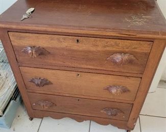 small antique cabinet, there is another, larger, matching piece