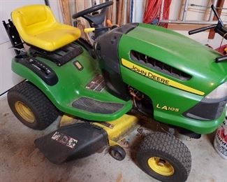 John Deere 5 forward two reverse speeds riding lawnmower tractor, accessories available 5.0 24" electric start 210 Hours of Use