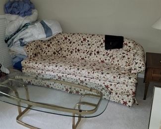 Love seat, Linens, Brass and glass coffee table
