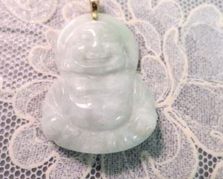 14k gold jade Buddha pendant.