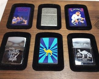 (12) CAMEL COMPANY ZIPPO LIGHTERS AND DISPLAY
