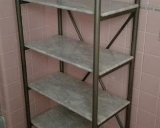 Metal shelving unit with marble shelves