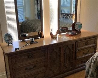 Large dresser, 2 mirrors, has matching night stands, bed and mall Armoire in excellent shape.