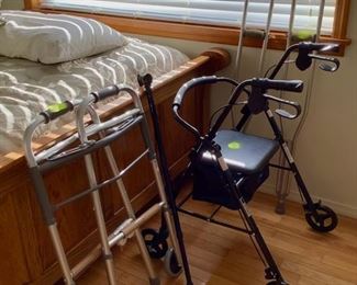 Walker, crutches, and Roll-Along Walker.