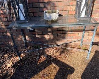 $150 - LOT 20 - Metal and glass console table. 50 inches long, 17 inches wide, 27.5 inches tall.