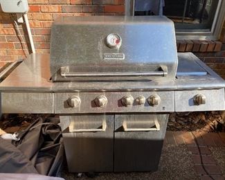$295 - LOT 24 - Kitchen Aid 4 burner grill with cover. 5 feet long, 2 feet deep, 4 feet high. 