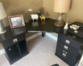 $125 - LOT 40 - Black corner desk and chair. 63 inches wide, corner piece comes out 44 inches from corner to edge of desk. 