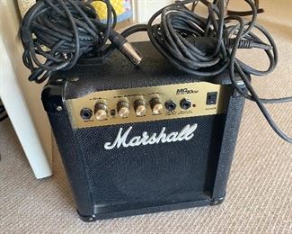 $35 - LOT 43 - Marshall amplifier and 2 microphones. MG series 10 CD. Amp is 24 inches tall. 