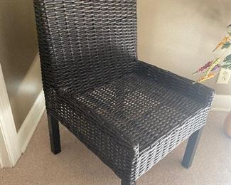 $45 - LOT 46 - Faux wicker chair. 37 inches high, 21 inches wide.