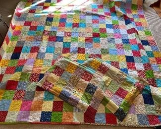 $55 - LOT 49 - Quilt and 2 pillow cases. Quilt is 91 inches square.