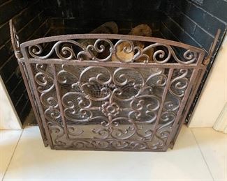 $65 - LOT 57 - Cast Iron Fire screen. Front panel is 38 inches tall, 22 inches wide,  side panels are 24 inches tall, 7 inches wide.