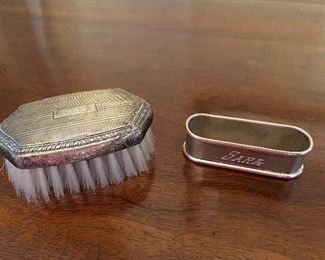 $24 - LOT 67 - Sterling napkin ring "Sara" and baby brush "Tommy"