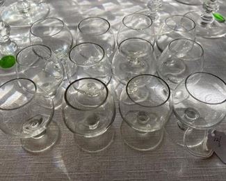 $40 - LOT 76 - 12 crystal glasses. 2.25 inches tall.