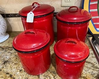 $20 - LOT 92 - Set of 4 red enamel metal cannisters. 
