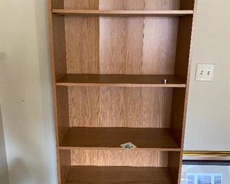 $45 - LOT 101 - Laminate book shelf. 71 inches tall, 30 inches wide, 11.75 inches deep.